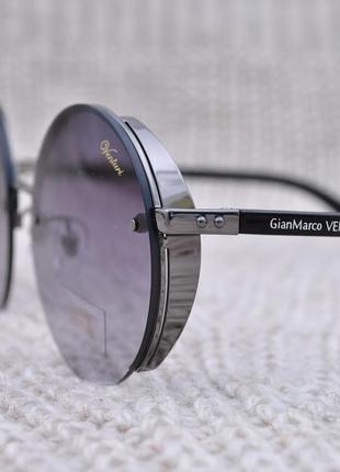 Красивые круглые  солнцезащитные очки с боковой шорой gian marco venturi gmv8591 фото