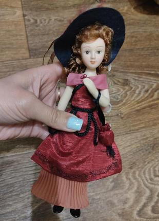 Фарфоровая коллекционная кукла1 фото