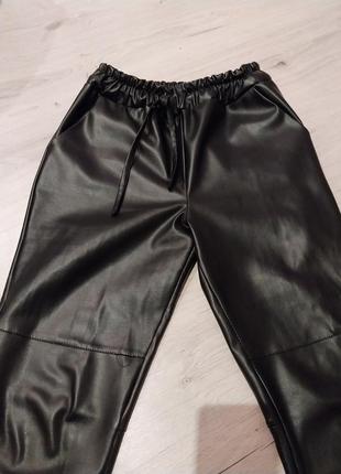 Шкіряні штани з утепленням