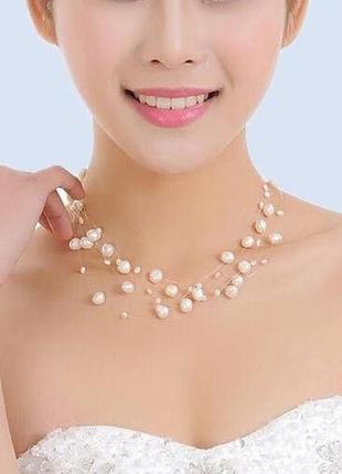 Украшение на шею из жемчужин.