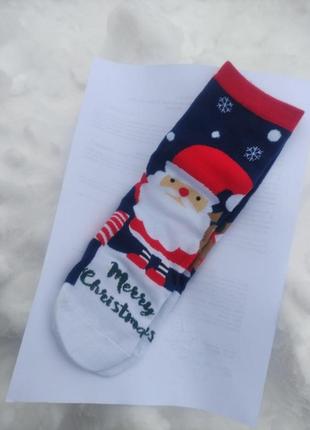 Подарункові набори новорічних носочків3 фото