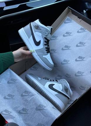 Зимние женские кроссовки nike air jordan 1 high gray white black fur <unk> smb4 фото