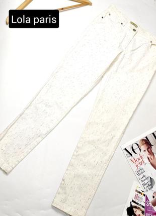 Джинсы женские скинни белого цвета в разноцветную точку со средней посадкой от бренда lola paris 36