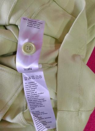 Салатовий трикотажний жіночий піджак, рр.36,385 фото