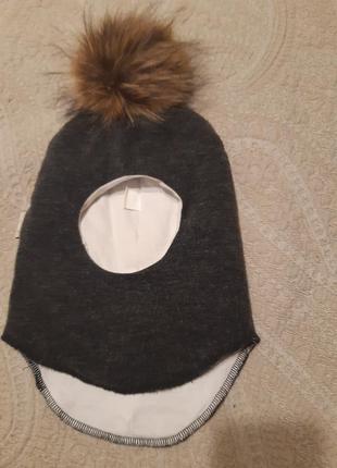 Зимняя шапка шлем с добавлением вовнт на трикотажной подкладке, утеплена тонким стэнтепоном бомбон из натурального меха1 фото