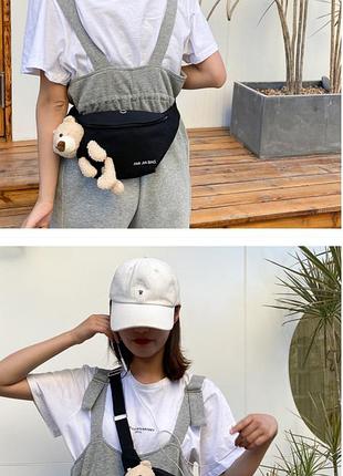 Брендова сумочка для телефона та дрібниць