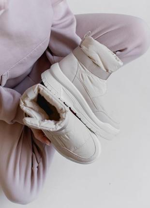 Білі кросівки-дутики - ваш стильний та комфортний вибір для активного життя ❄️6 фото