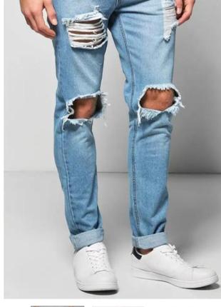 Чоловічі рвані сині джинси1 фото