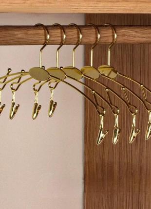 Вешалки плечики тремпеля (бельевые) для нижнего белья, купальников, трусов с прищепками металлические, золотые9 фото