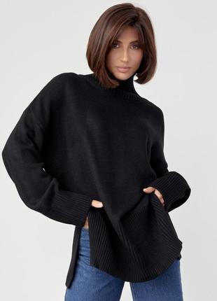 Женский вязаный свитер oversize с разрезами по бокам1 фото