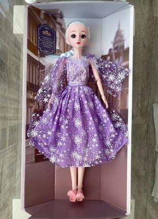 Ростовая шарнирная кукла "разумница" 60 см 1/3, фиолетовое платье1 фото
