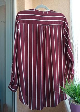 Красивая удлиненная блуза с длинным рукавом в вертикальную полоску3 фото