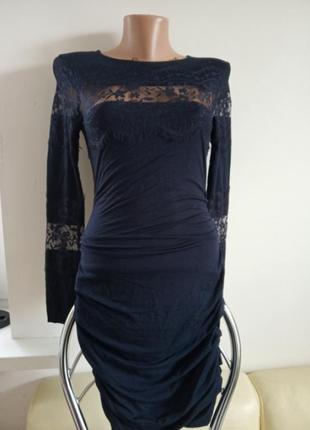 Елегантна сукня темно синього кольору.1 фото