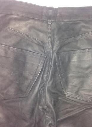 Трендовые кожаные штаны с высокой талией на болтах2 фото