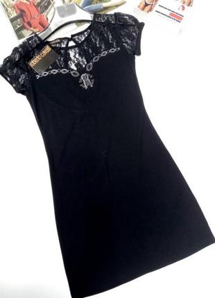 Цікаве  коротке чорне трикотажне плаття1 фото