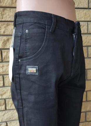 Зимние мужские джинсы на легком флисе стрейчевые lanlaniee5 фото