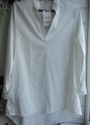 Блуза-туника с карманами по боках