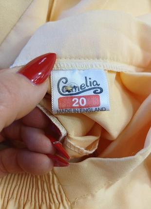Новая лаконичная юбка миди в сдержанном желтом цвете с карманами, размер л-2хл10 фото