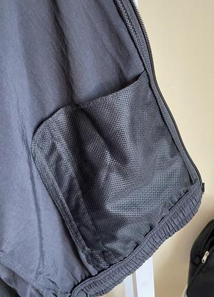 Легка куртка women's waterproof jacket adidas essentials repeat hc91608 фото