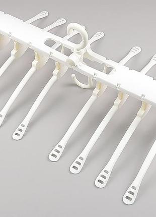 Вешалка-органайзер на 8 плечиков  для одежды молочного цвета10 фото