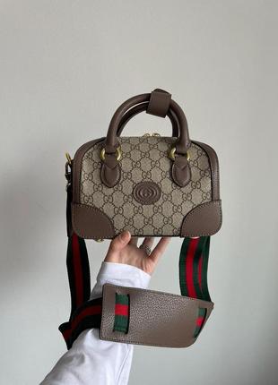 gucci 100 geometric print duffle bag item