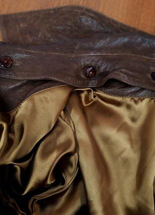Нарядная кожаная куртка с украшениями8 фото