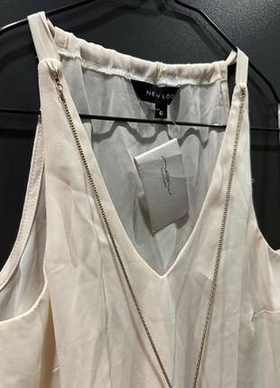 Легкая молочная блуза с украшением3 фото