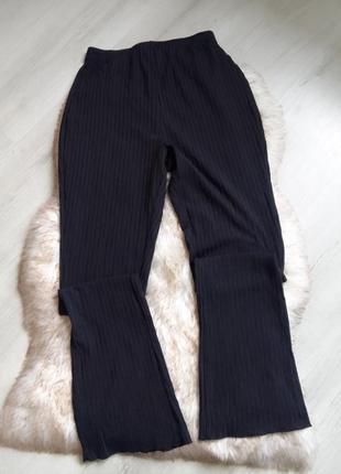 Брюки в рубчик клешни