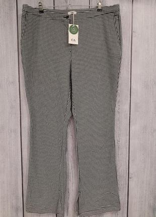Демисезонные брюки-клеш с разрезами батал (наш 54/56)4 фото