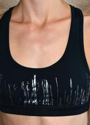 Спортивний топ з красивою "спинкою" forever 21