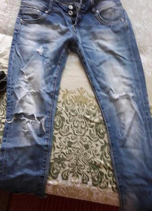 Рвані джинси.2 фото