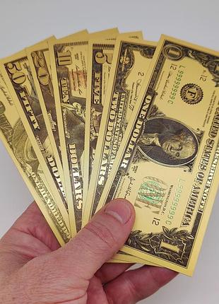 Комплект сувенирных долларов 1, 2, 5, 10, 20, 50, 100$ (золотые) арт. 04358