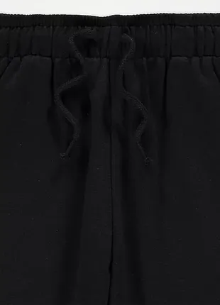 Чорні утеплені штани3 фото