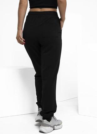 Чорні трикотажні штани з декором на манжетах3 фото
