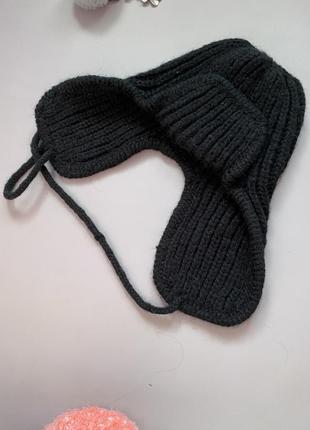 Теплая зимняя шапка черного цвета7 фото