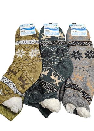 Чоловічі шкарпетки-тапочки на хутрі зі сніжинками та оленями8 фото
