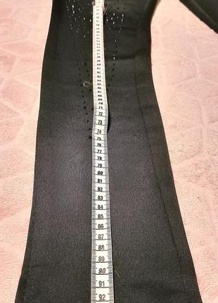 Крутые стрейчевые черные брюки с черными стразами5 фото