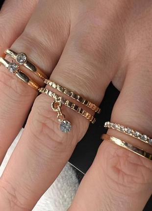 Святковий новорічний комплект золотих золотистих кілець каблучок, золоте золотисте кільце каблучка