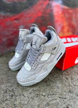 Мужские кроссовки nike air jordan 4 retro kaws grey серого цвета