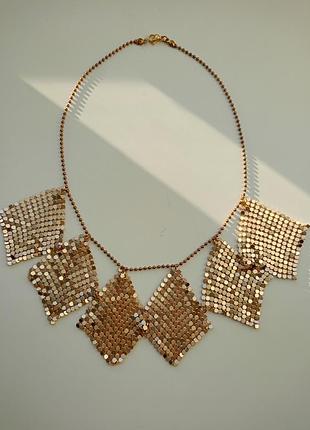 Золоте кольє-кільця