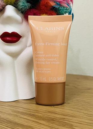 Оригінал зміцнювальний денний крем clarins extra firming energy