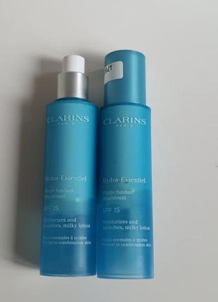 Сироватка для обличчя clarins hydra-essentiel milky lotion spf 15