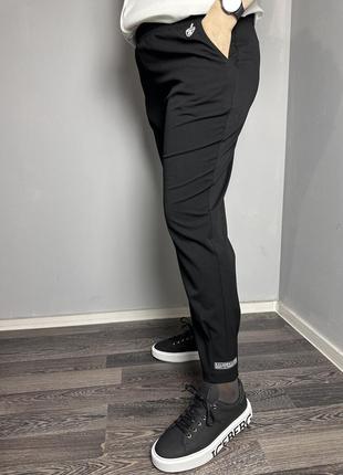 Женские брюки чёрные в стиле спорт большого размера modna kazka mkjl1134-1