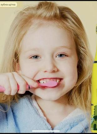 Дитяча зубна щітка електрична sonic toothbrush від 6 до 12 змінних насадок2 фото