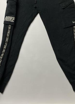 Спортивные штаны nike карго черные с лампасами оригинал3 фото