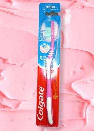Зубна щітка  colgate  середньої жорсткості "extra clean"рожева