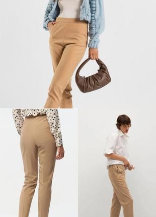 Стильные брюки со складками и стрелками1 фото