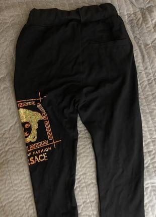 Спортивные черные штаны высокая посадка с манжетами и стразами камушками версаче, сортирует брюки штаны10 фото