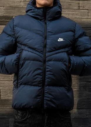 Пуховик nike у темно-синьому