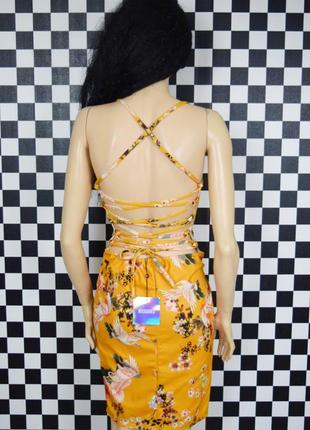 Гірчичне красиву сукню з журавлями квітами шнурівкою на спинці5 фото
